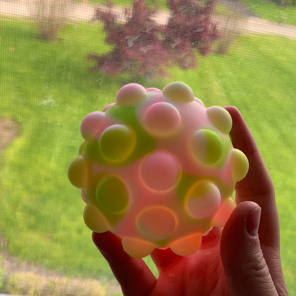Green, pink, and white pop it light up ball!